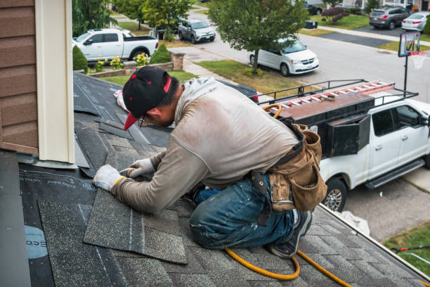 Professional Roofing technician working in Mead, CO